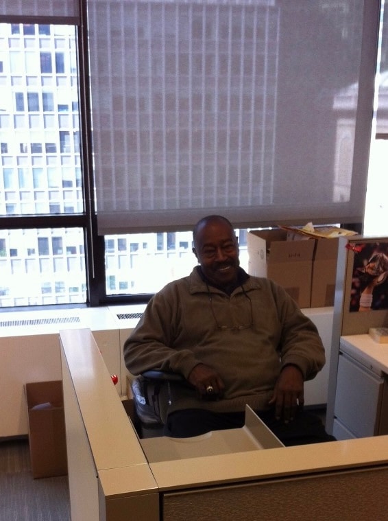 Dr. Charlie Whitcomb seated in his San Jose State University office